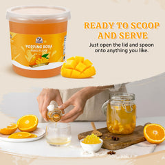 52USA.com topping de perlas de mango sobre una bola de helado para contraste cremoso