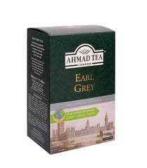 Ahmad Tea taza servida con vapor, aroma cítrico listo para beber