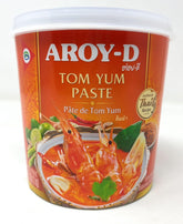 Aroy-D envase de Tom Yum Paste 1000G mostrando etiqueta y tamaño, facilita preparación