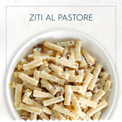 Barilla ziti cocido en plato con salsa, presentación apetecible y uniforme