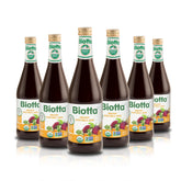 Biotta botella Breuss frente mostrando etiqueta y vidrio reciclable, aporta confianza