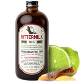 Bittermilk botella frontal mostrando etiqueta y volumen, lista para preparar cócteles