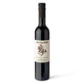 Blazing Bella botella frontal mostrando apariencia elegante y sabor consistente