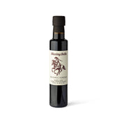 Blazing Bella botella frontal mostrando etiqueta y botella premium
