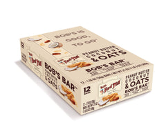 Bob's Red Mill barrita sostenida en mano ideal para llevar y comer