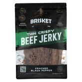 Brisket Chips Co frente del empaque que muestra sabor pimienta negra y alta proteína