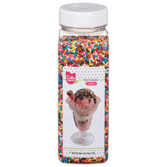 Cake Mate bote frontal 26 oz mostrando el contenido colorido y práctico uso