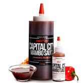 Capital City pack frontal mostrando botellas y etiquetas claras