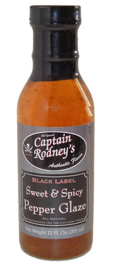 Captain Rodney's frasco frontall mostrando etiqueta y tamaño, aporta conveniencia
