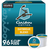 Caribou Coffee paquete Daybreak frontal mostrando 96 cápsulas y beneficio conveniencia