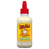 Cholula crema frente de botella mostrando etiqueta y formato práctico