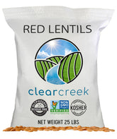 CLEAR CREEK paquete frontal 25 lb mostrando marca y beneficio de libre glifosato