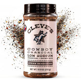 Cleve's Gourmet envase frontal Cowboy Charcoal 10oz mostrando etiqueta y diseño