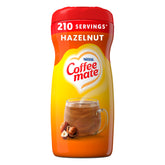 Coffee‑mate frente del envase mostrando sabor avellana y facilidad de uso