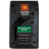 Copper Moon frontal del paquete mostrando blend Guatemalan Antigua y beneficio de frescura