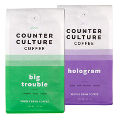 Counter Culture frente de las bolsas Big Trouble y Hologram mostrando diseño