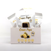 CRAVECLEAN caja completa de White Chocolate Brownie Pops, snack proteico práctico