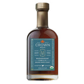 Crown Maple botella frontal con etiqueta clara y sabor vainilla, aspecto premium