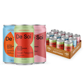 De Soi packaging frontal mostrando las tres latas y estilo premium