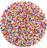 DM Sweets frente del empaque mostrando 1 libra y colores vibrantes para decoración