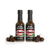 El Yucateco frasco frontal mostrando etiqueta negra y beneficio de sabor intenso