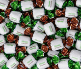 EMPORIUM CANDY TASTY TREATS FOR THE TUMMY paquete frontal mostrando cantidad 2 libras y envases, conveniencia