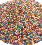 EMPORIUM CANDY paquete frontal de Rainbow Nonpareils mostrando 2 libras y beneficio de gran cantidad