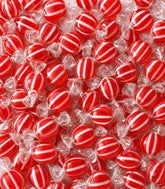 EMPORIUM CANDY paquete frontal mostrando 2 lb y diseño rayado, ideal para eventos