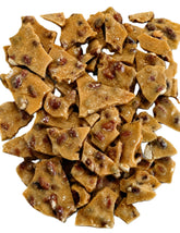 EMPORIUM CANDY frente del paquete de peanut brittle con aspecto apetitoso