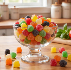 Emporium Candy gomitas en un bol transparente, ideal para presentación en eventos