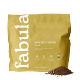 Fabula frasco frontal del café descafeinado orgánico mostrando etiqueta y beneficios