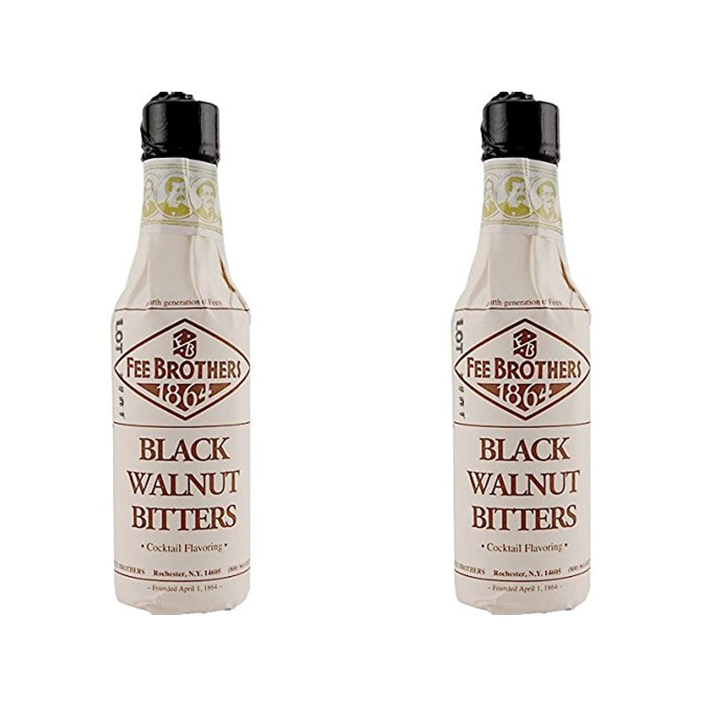 Fee Brothers botella frente mostrando etiqueta negra y beneficios aromáticos