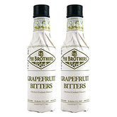 Fee Brothers frasco frontal de Grapefruit Cocktail Bitters mostrando etiqueta clara y tamaño 5 oz, aporta sabor cítrico