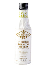 Fee Brothers botella frontal de Turkish Tobacco bitters mostrando etiqueta y tamaño útil en barra