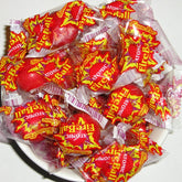Ferrara ATOMIC bolsa frontal de 1lb mostrando presentación a granel y marca
