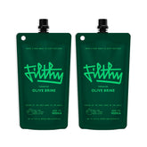 Filthy Olive Brine frontal del envase mostrando diseño y beneficio práctico