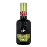 Fini botella frente mostrando diseño y uso fácil