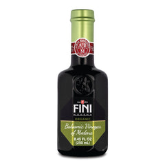 Fini botella frente mostrando diseño y uso fácil