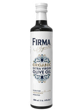 Firma botella frontal en vidrio oscuro protegiendo polifenoles y sabor