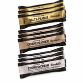 FlexFinity kit frontal mostrando barras Barebells y vaso reutilizable, conveniencia inmediata