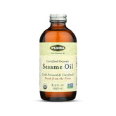 FloraHealth frasco frontal de aceite de sésamo orgánico mostrando etiqueta clara