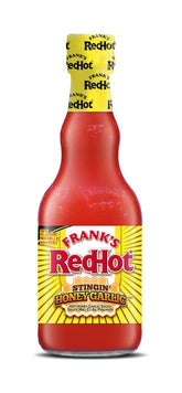 Frank's RedHot frasco frontal mostrando etiqueta y volumen