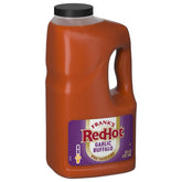 Frank's RedHot jarra frontal mostrando tamaño medio galón y lista para uso