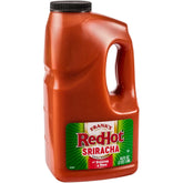 Frank's RedHot garrafa frontal mostrando etiqueta y volumen, ideal para cocinas