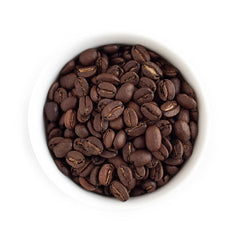 Fresh Roasted Coffee granos enteros primer plano que conservan frescura