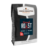 Fresh Roasted Coffee paquete frente mostrando marca y tamaño 2 lb, atractivo visual