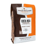 Fresh Roasted Coffee empaque frontal 2 lb mostrando origen y beneficio de frescura
