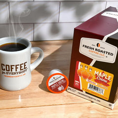 Fresh Roasted Coffee detalle del café molido dentro de la cápsula mostrando textura y aroma