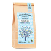 Friendship Organics frente del paquete mostrando 36 bolsitas y beneficios orgánicos
