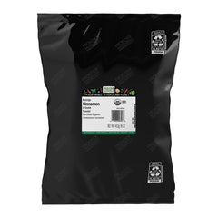 Frontier Co-op frasco frontal mostrando canela Korintje orgánica y cantidad